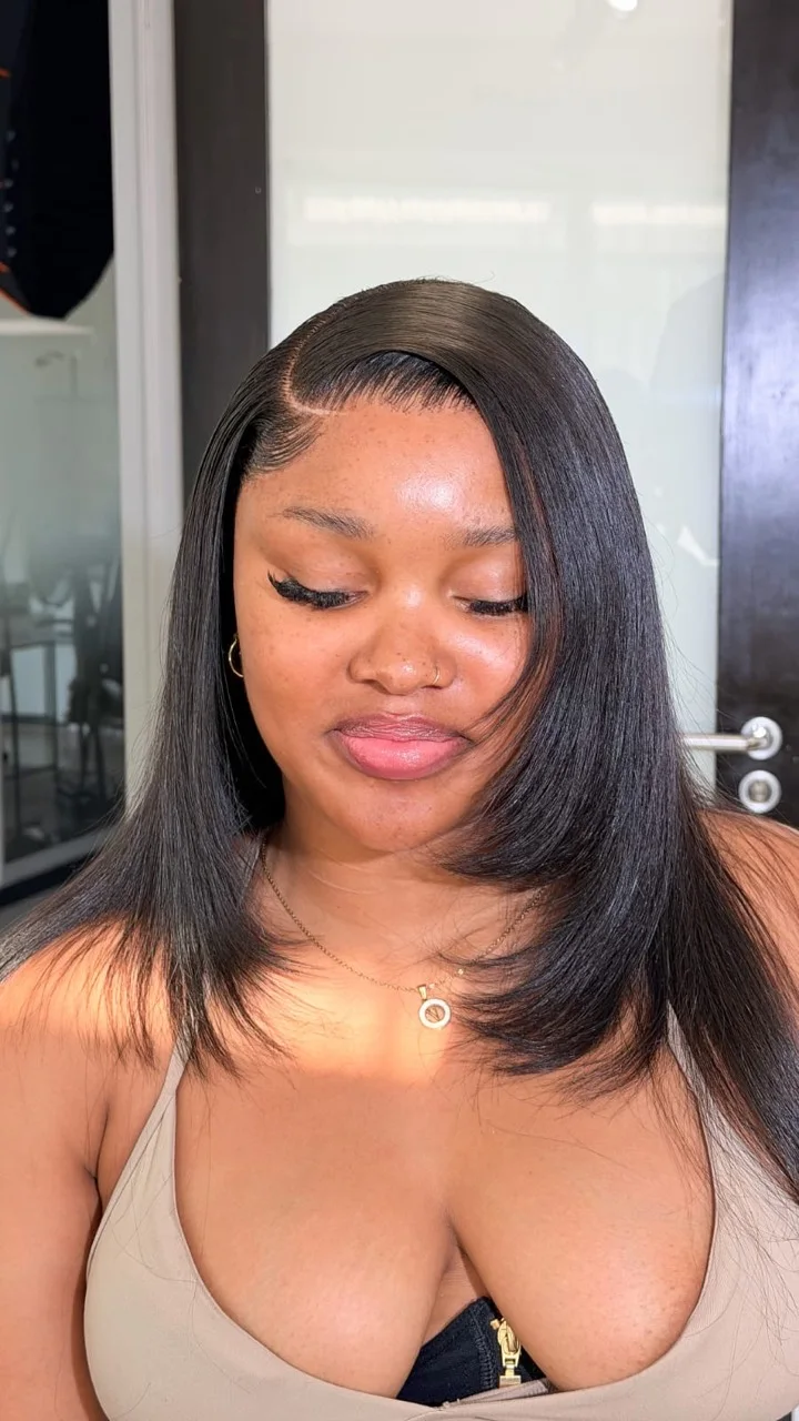 Smooth side-part hair with face-framing layers